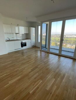 Wohnen in der obersten Wohnung mit EBK, Tiefgaragenstellplatz und Weitblick! - Erlangen