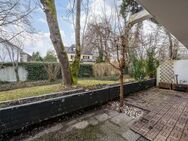 AIGNER - Erdgeschosswohnung mit Westterrasse und Privatgarten - München