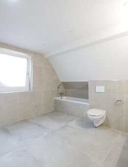 7,12 % Rendite, Faktor 14,04. Gepflegte, vermietete Maisonettewohnung mit 1.300 € Kaltmiete - Bad Driburg