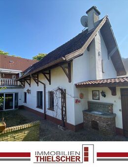 Geräumiges Reihenmittelhaus mit Garten, Dachterrasse und Gartenhaus in Scherpenseel - Übach-Palenberg