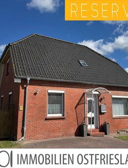 Teilmodernisiertes Einfamilienhaus mit Charakter und großem Grundstück - Krummhörn