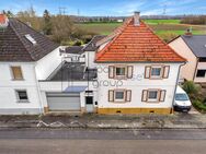 Sanierungsbedürftiges Einfamilienhaus mit großem Grundstück und Baupotenzial in Hofheim - Lampertheim