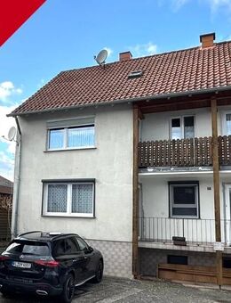Teilvermietetes Dreifamilienhaus mit Garage und Nebengebäude in ruhiger Lage von Mehlingen - Mehlingen