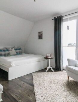 Top modernisiert in Laggenbeck: Doppelhaushälfte mit Wintergarten, Sauna & großer Doppelgarage - Ibbenbüren