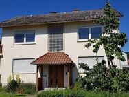 frei stehendes 2 Familienhaus mit Nebengebäude - Oerlenbach