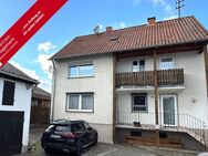 Teilvermietetes Dreifamilienhaus mit Garage und Nebengebäude in ruhiger Lage von Mehlingen - Mehlingen