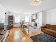 AIGNER - Helle 2-Zimmer-Wohnung mit Loggia in begehrter Lage Nymphenburgs - München