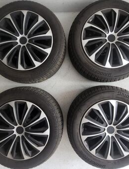 neuwertige Winterreifen auf Stahlfelge+Radkappen zu verkaufen - Algermissen